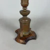 Antiker Kerzenhalter aus Messing mit Holzfuß, 20. Jh