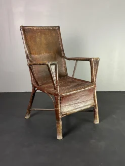 Art Deco Wabi Sabi Colonial Armlehnstuhl aus Rattan & Kunstleder, 1920er