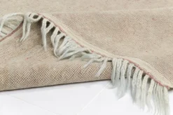 Ausgeblichener Teppich