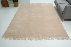 Ausgeblichener Teppich