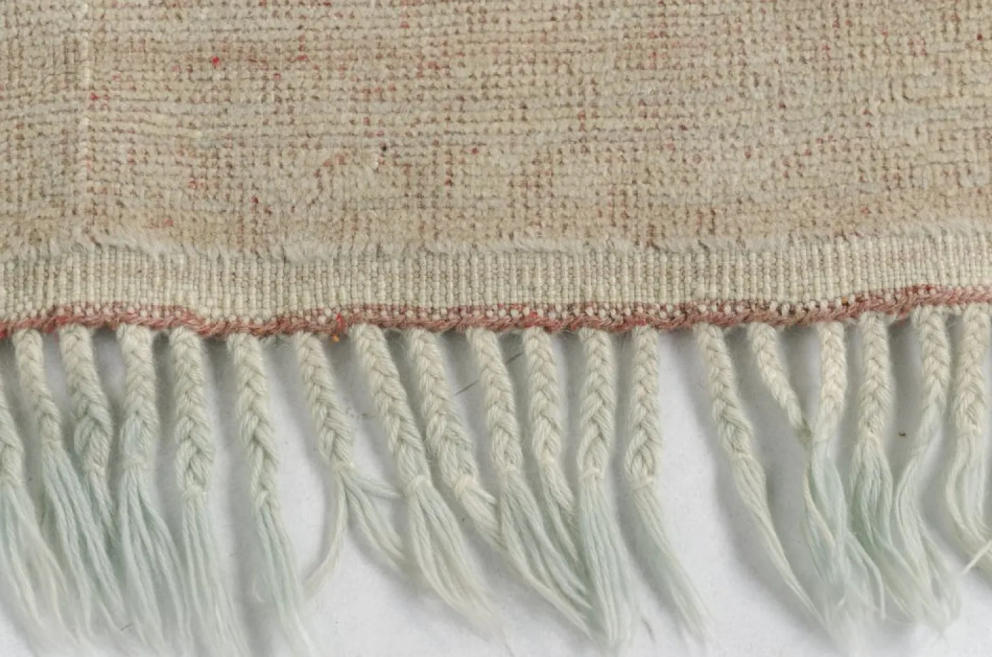 Ausgeblichener Teppich