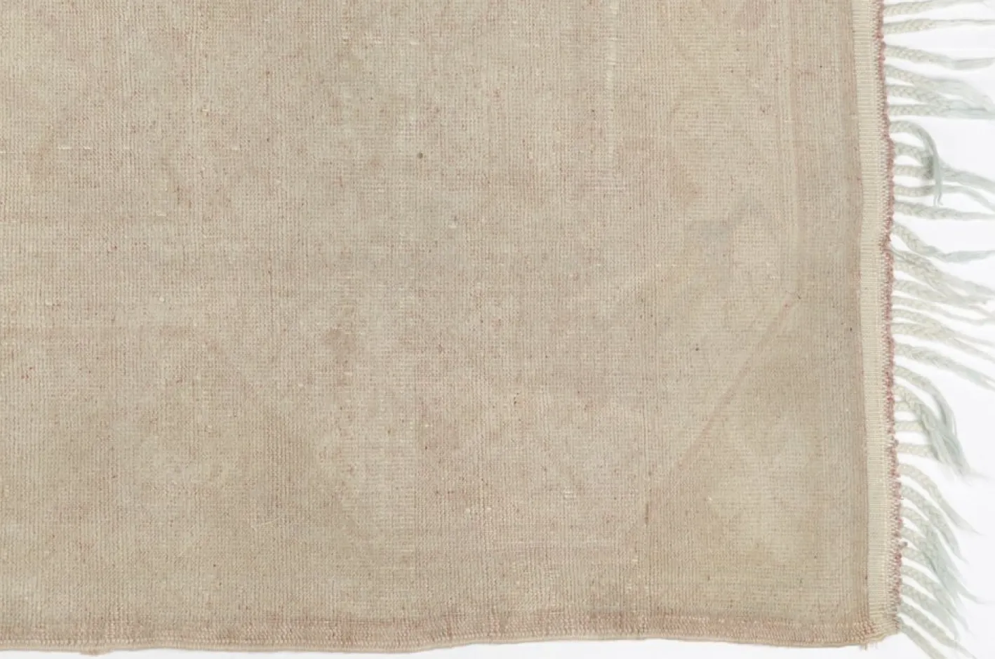 Ausgeblichener Teppich