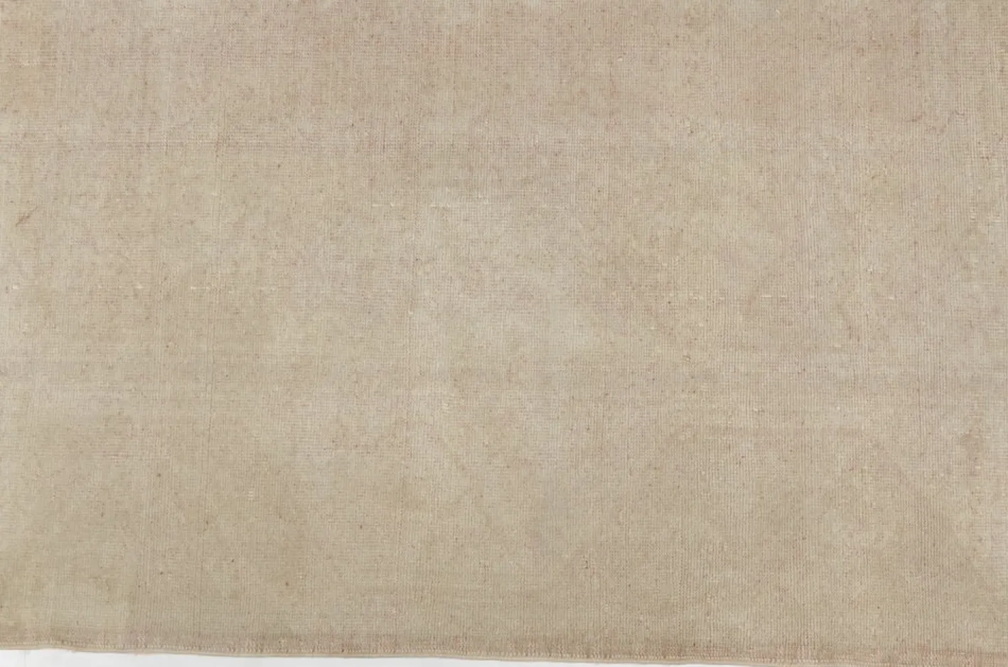 Ausgeblichener Teppich