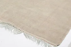 Ausgeblichener Teppich
