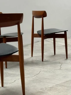 Esszimmerstühle aus Teak & schwarzem Leder von HW Klein für Bramin, Denmark, 1960er, 4er Set