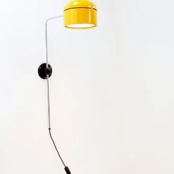 Gelbe Space Age Wandlampe von Arnold Berges für Staff Germany, 1970er