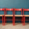 Italienische Vintage Stühle aus rot lackiertem Holz und geflochtenem Stroh, 1960er, 4er Set
