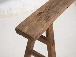 Kleine antike Holzbank
