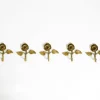 Mid-Century Kleiderhaken aus Messing in Rosen-Optik, 1950er, 5er Set
