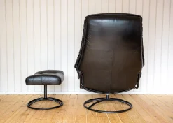 Norwegischer Sessel und Ottomane aus schwarzem Leder aus der Jahrhundertmitte von Ekornes, 1980er Jahre, 2er-Set