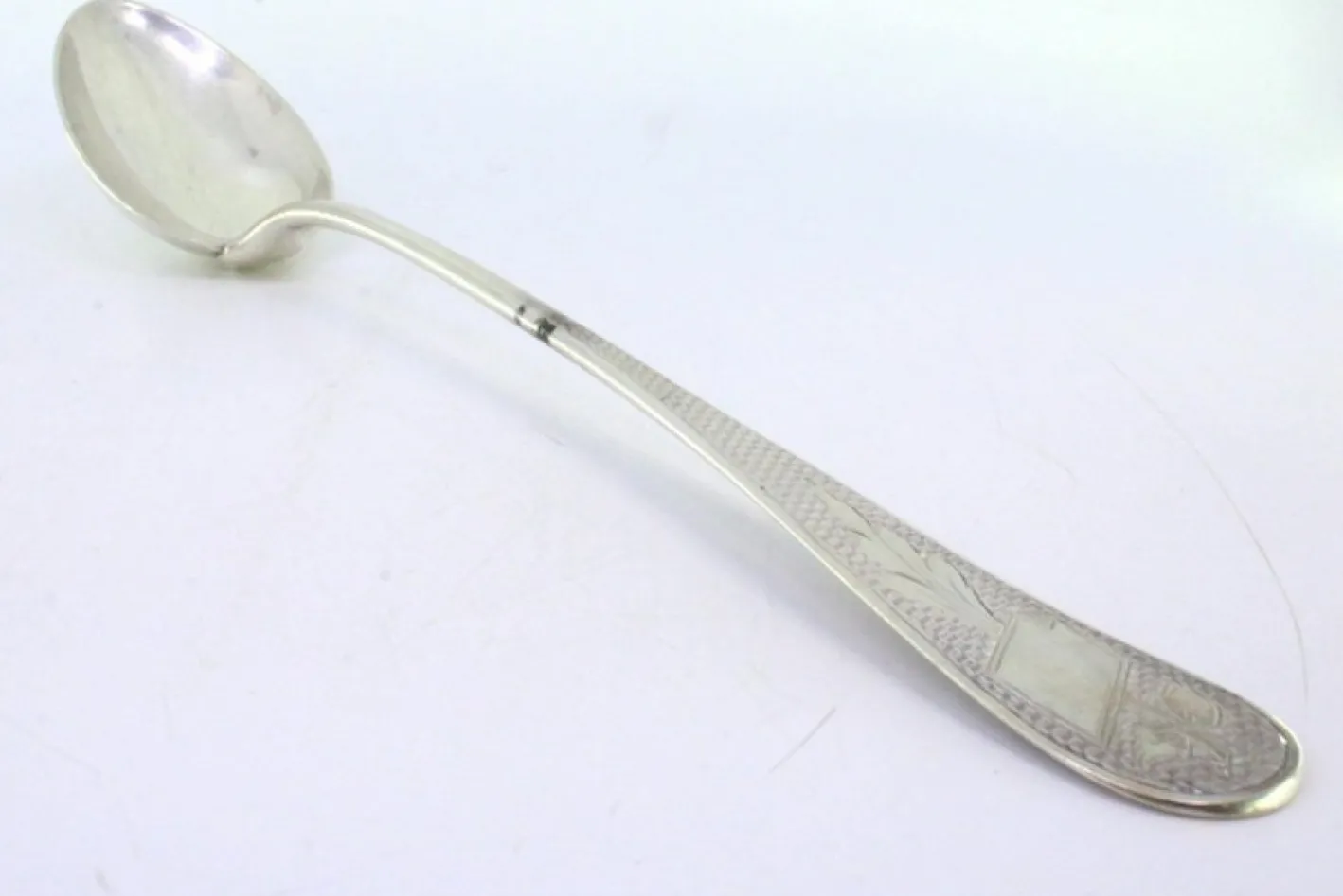 Reis- und Servierlöffel in Guilloche Silber