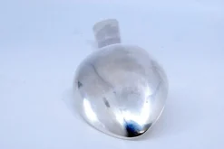 Reis- und Servierlöffel in Silber mit erhabenem Griff