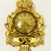 Schwedische Wanduhr aus vergoldetem geschnitztem Holz im Rokoko-Stil von Westerstrand, 1960er