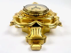 Schwedische Wanduhr aus vergoldetem geschnitztem Holz im Rokoko-Stil von Westerstrand, 1960er