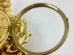 Schwedische Wanduhr aus vergoldetem geschnitztem Holz im Rokoko-Stil von Westerstrand, 1960er
