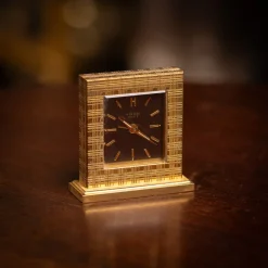 Schweizer Vintage Tischuhr aus vergoldetem Messing von Hermès, 1960er