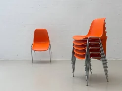 Stapelbare Europa Stühle in Orange von Helmut Starke für Embru, 1970er